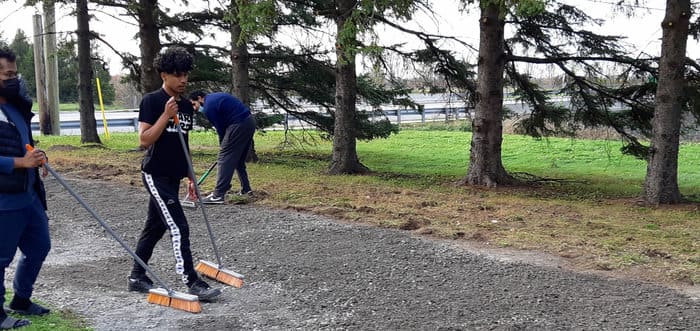 Brothers volunteering for property maintenance and cleaning
